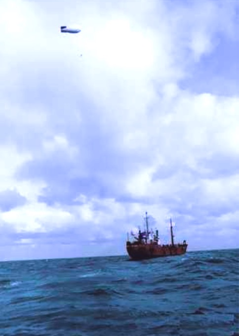 Radio ship flying a balloon