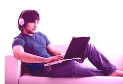 Male listener on laptop