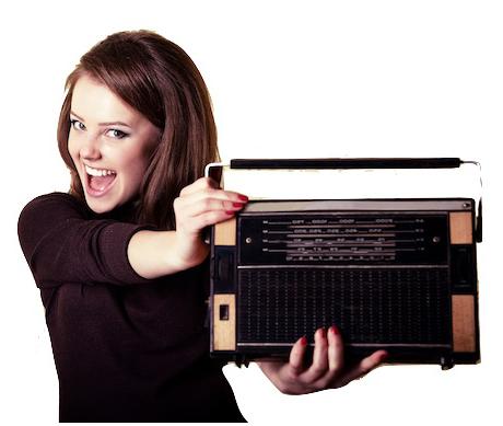 Girl Listens to a big radio