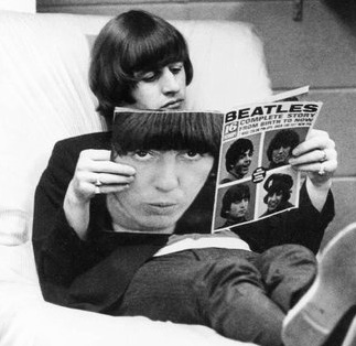 Ringo Starr reading magazine